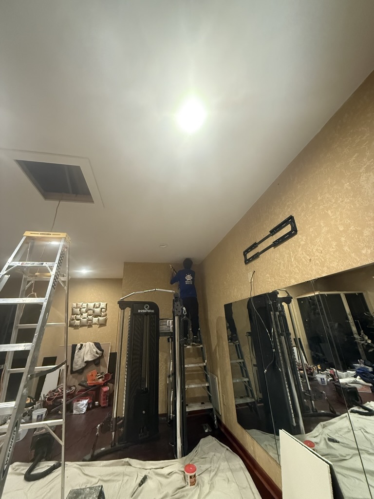 Drywall installation, taping, finishing, and attic access panel prep