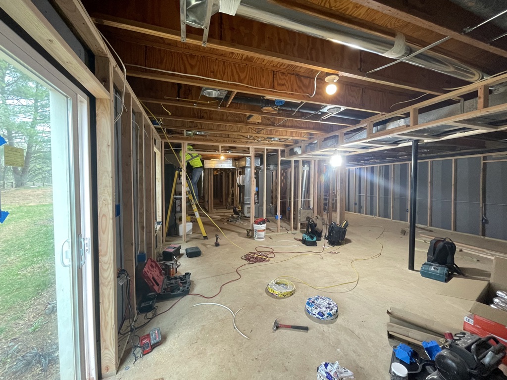 Rough construction progress with electrical and HVAC in place