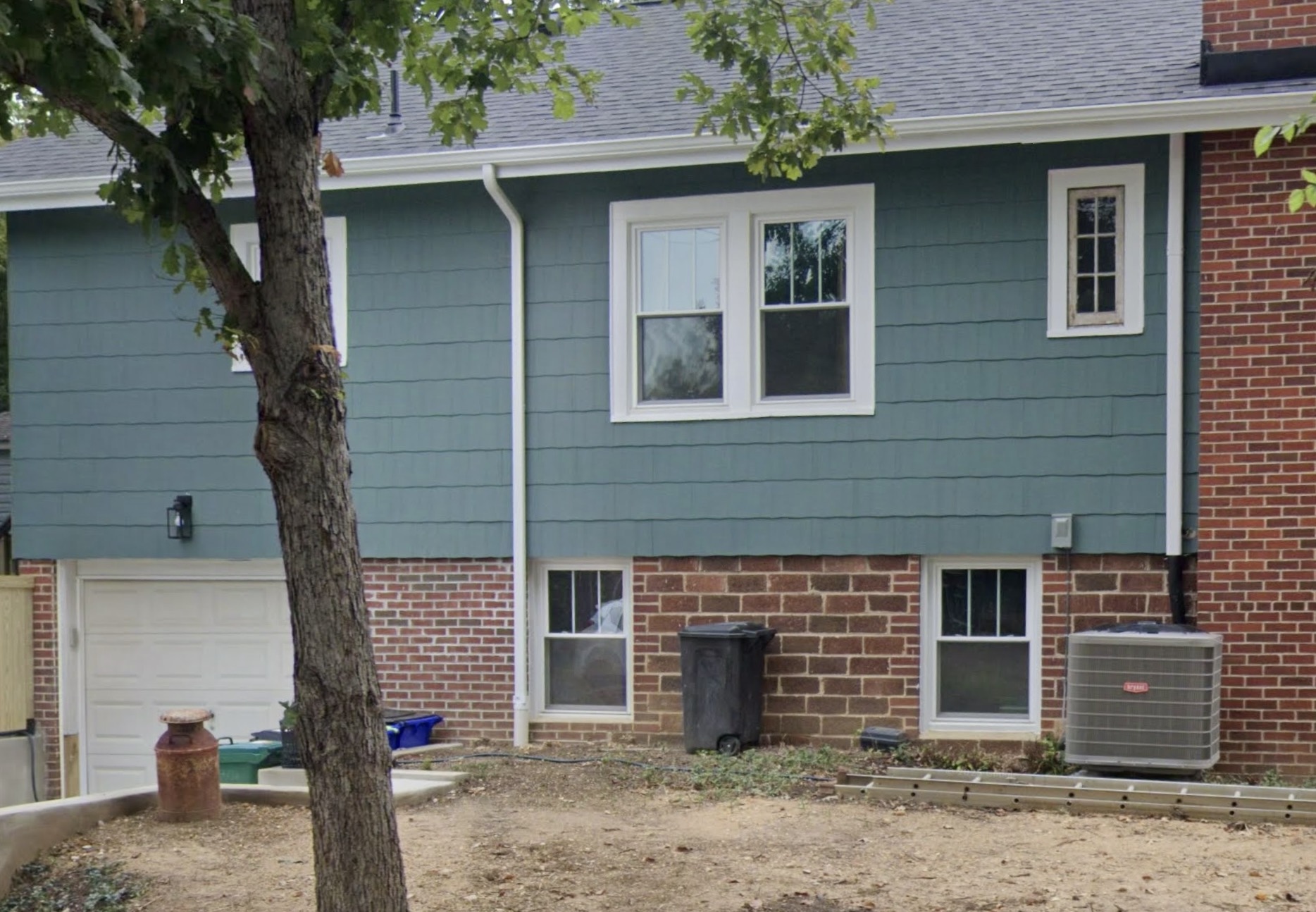 Existing home exterior before the residential addition was built
