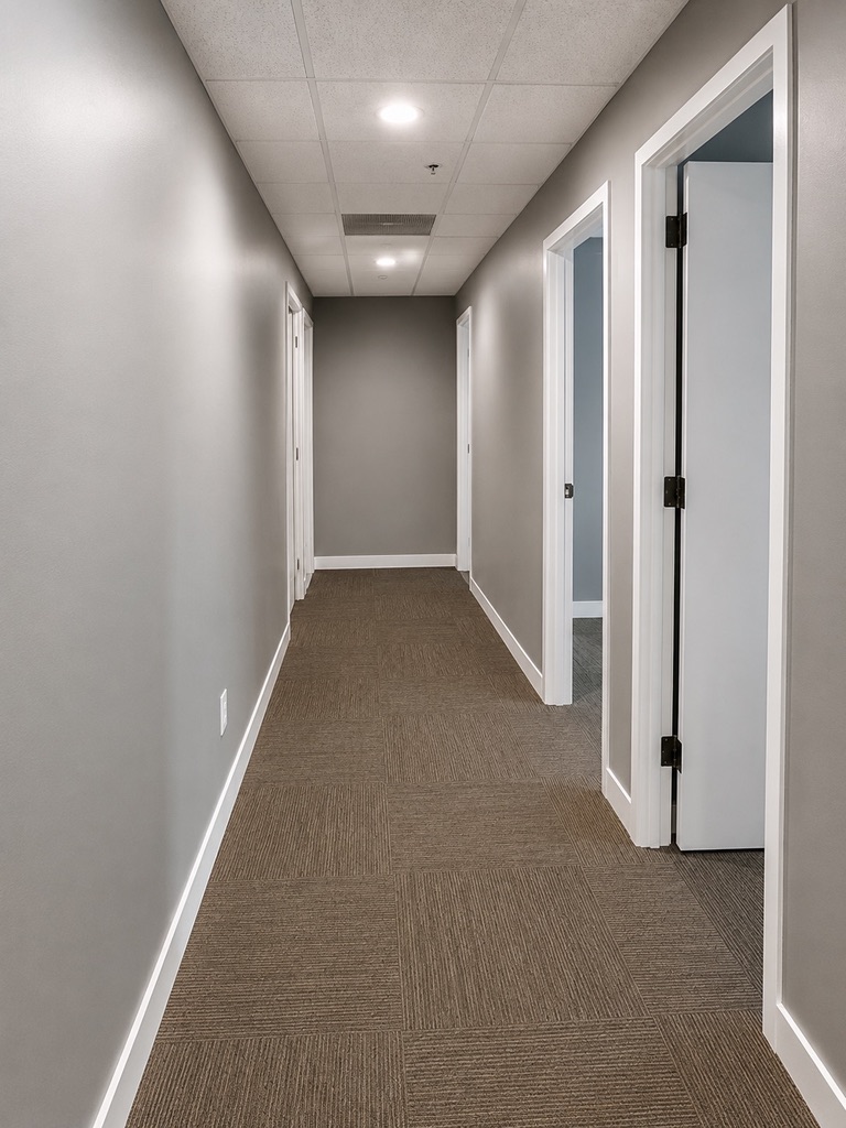 Completed hallway serving the new private offices