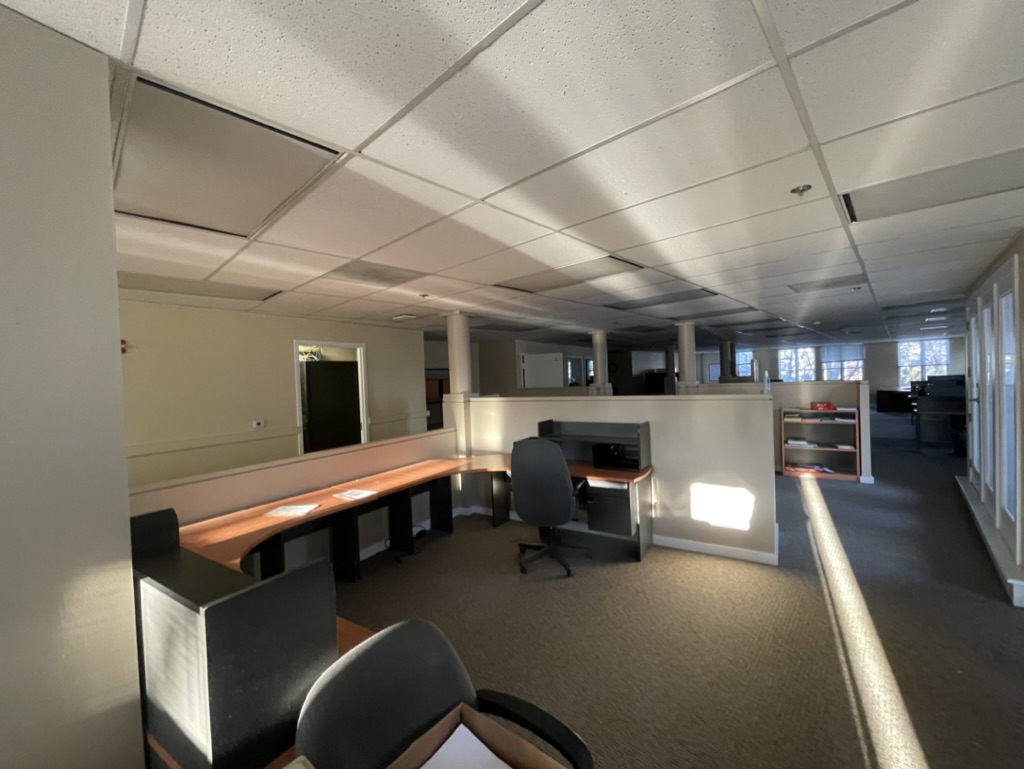 Existing open office space before construction