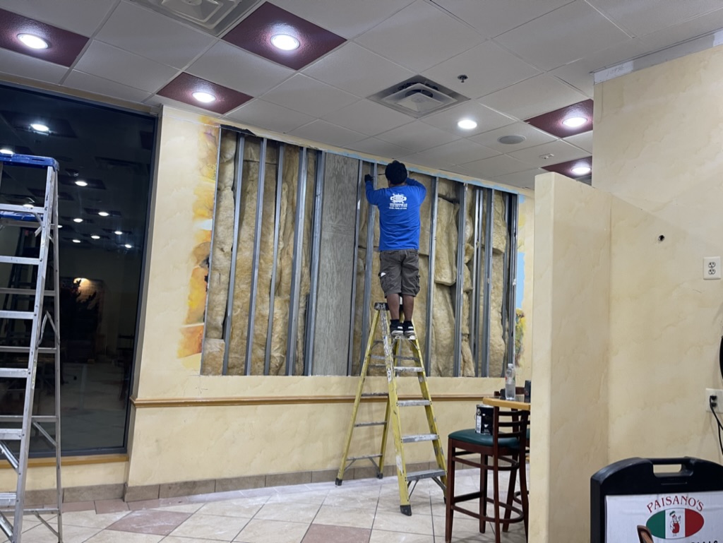 Wall opened during removal of the existing decorative wall finish