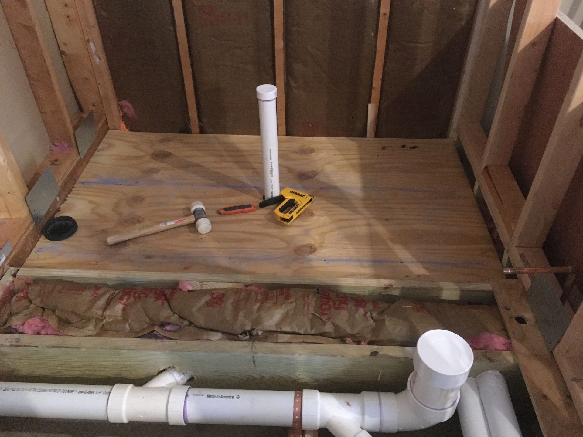 Shower area under construction and waterproofing preparation