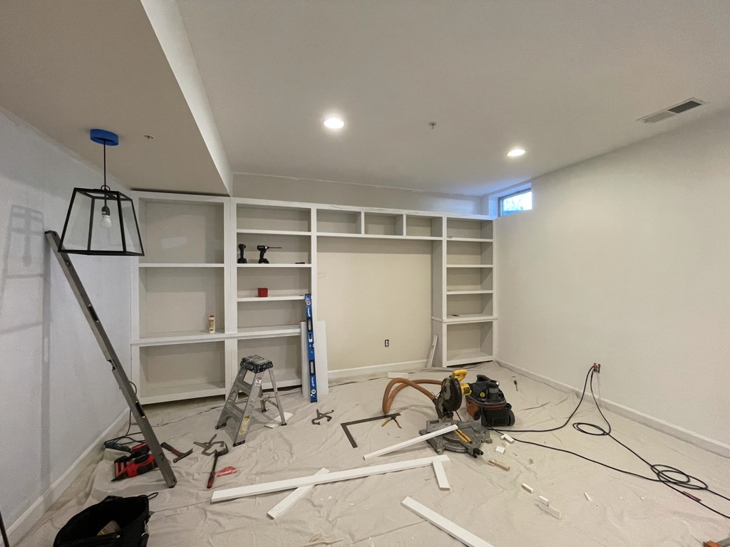 Custom built-in shelving and entertainment center fabrication