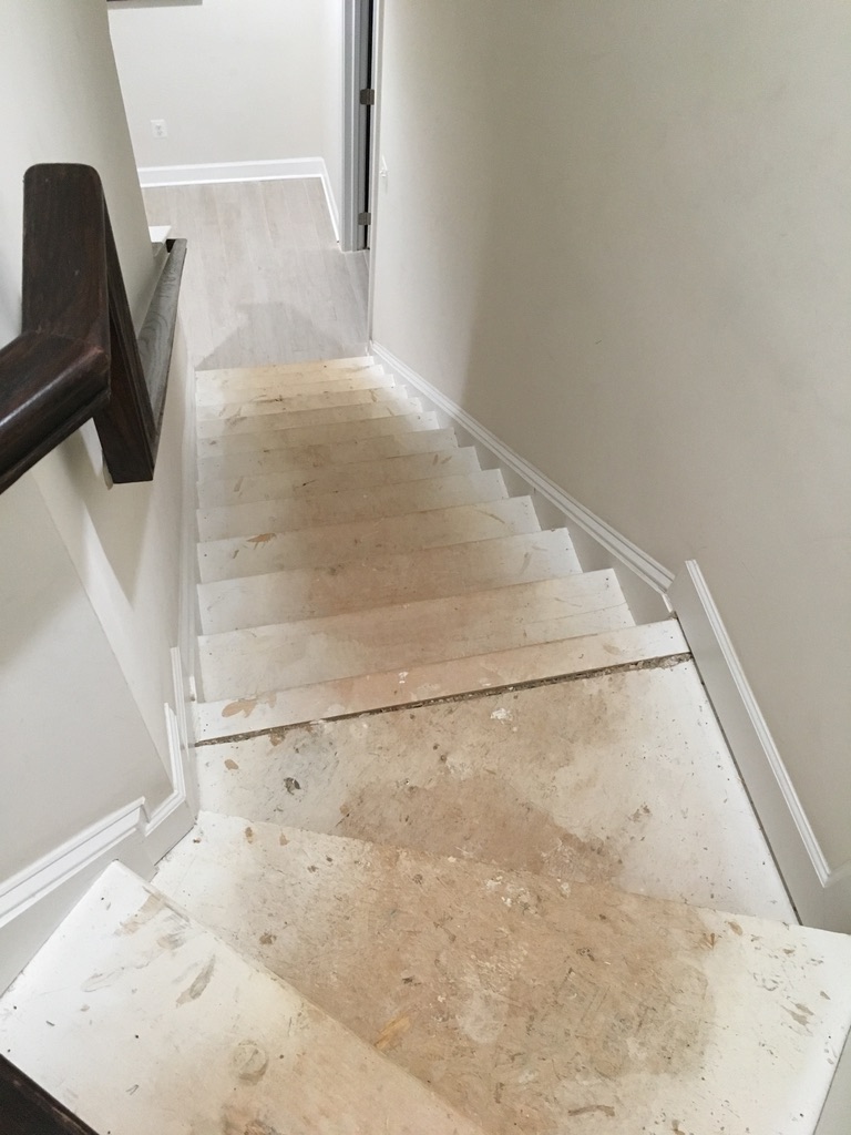 Unfinished stair treads before hardwood installation