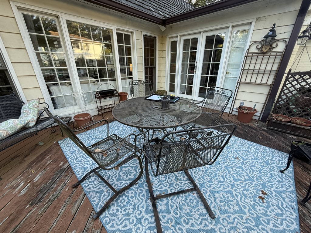 Original small wood deck with weathered boards before ESM Construction rebuild