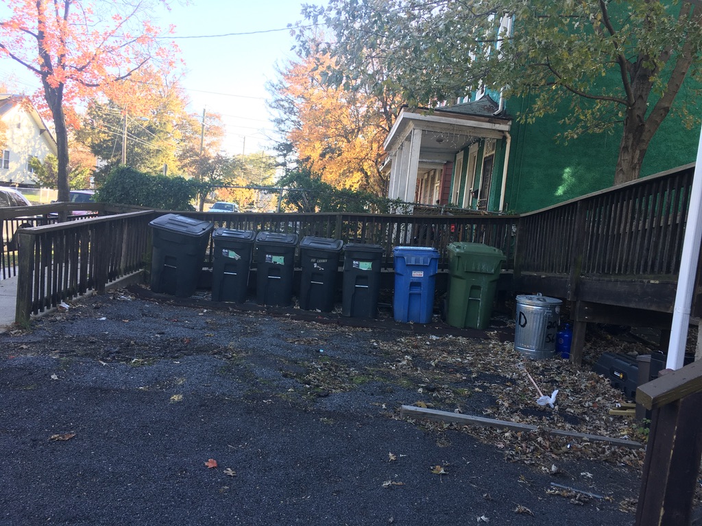 Existing accessibility ramp and rear deck before renovation