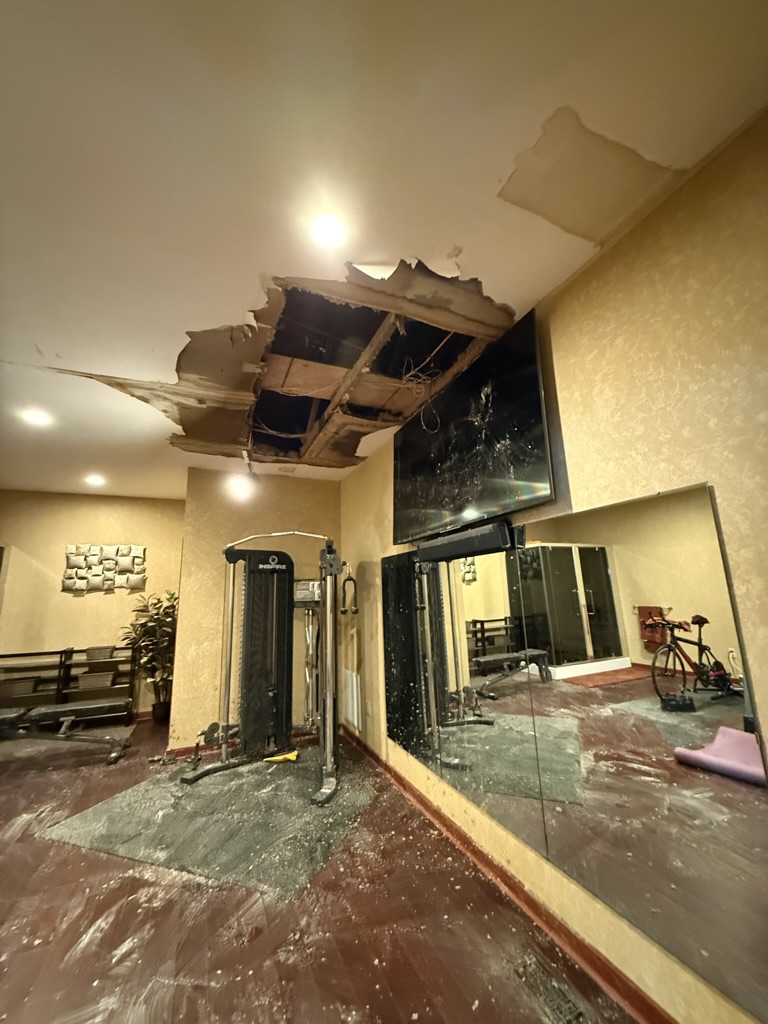 Initial ceiling collapse from burst water pipe