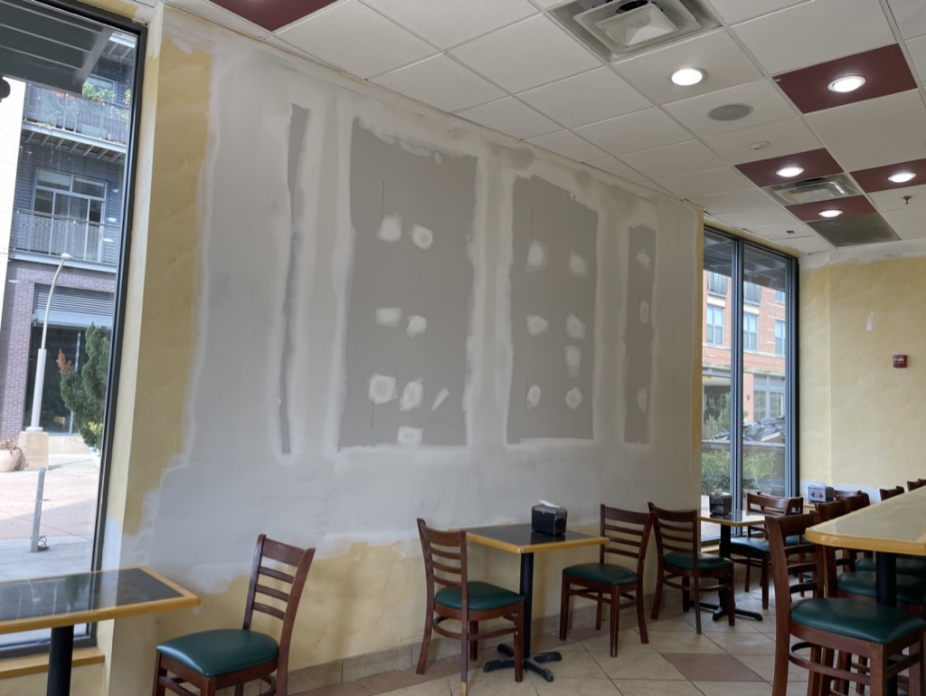 New drywall installed and prepared for finishing