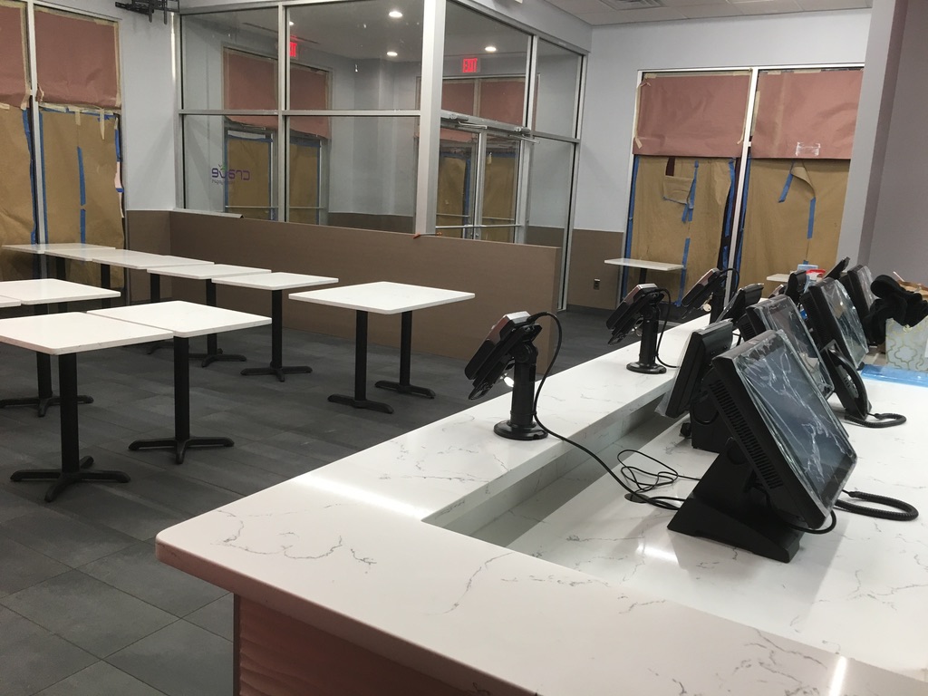 Finished restaurant dining counter built by ESM Construction LLC