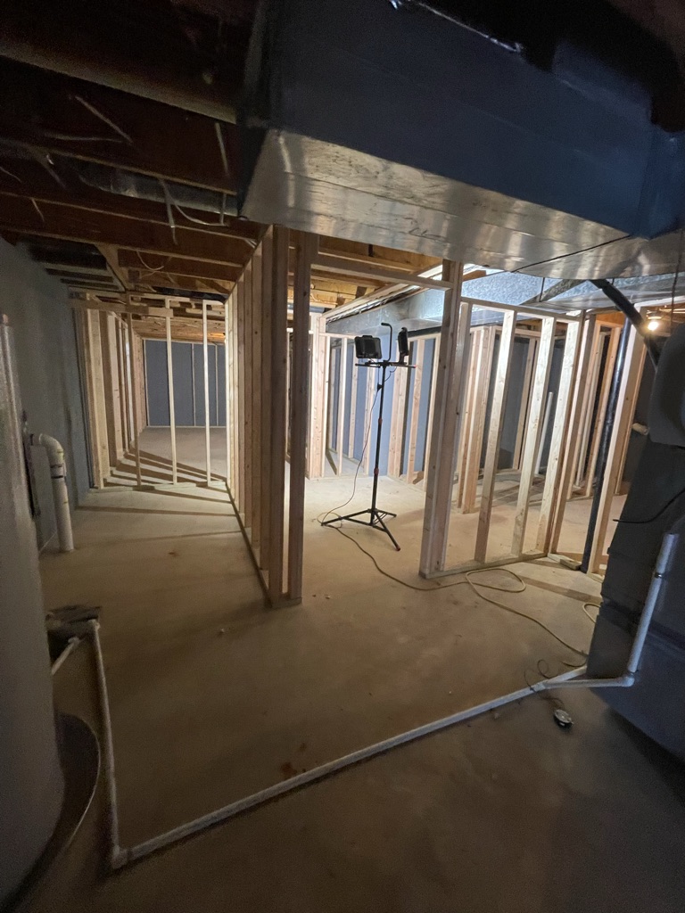Framing phase — new room and hallway layout taking shape