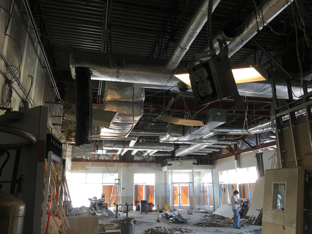 Wide view of the demolished commercial interior