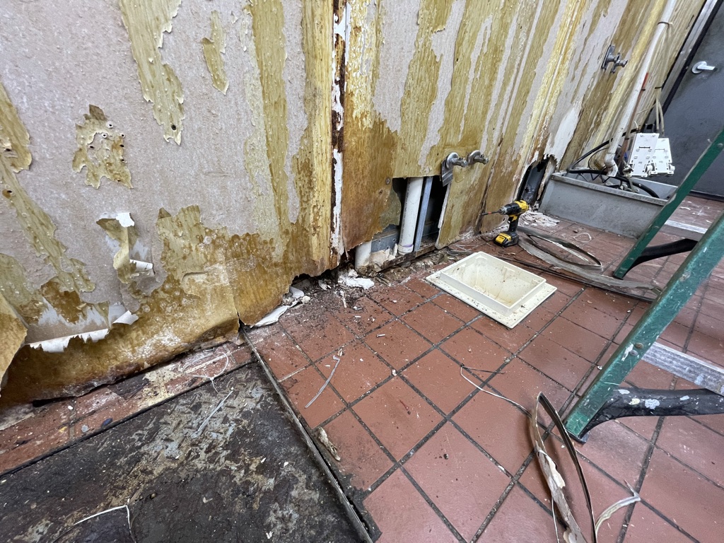 Demolition phase – water-damaged wall opened for repair