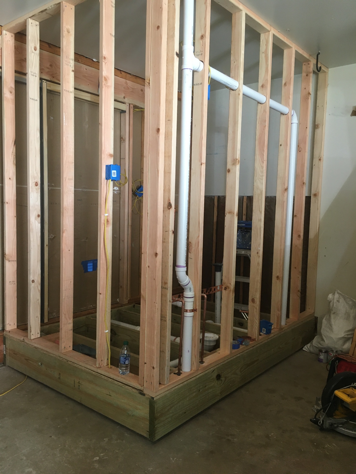 Framing, plumbing, electrical, and rough-in phase