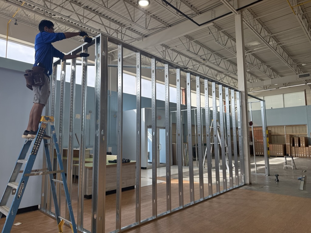 Metal stud framing for the new enclosed reception area