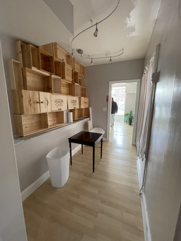Interior corridor during drywall, ceiling, and finish work