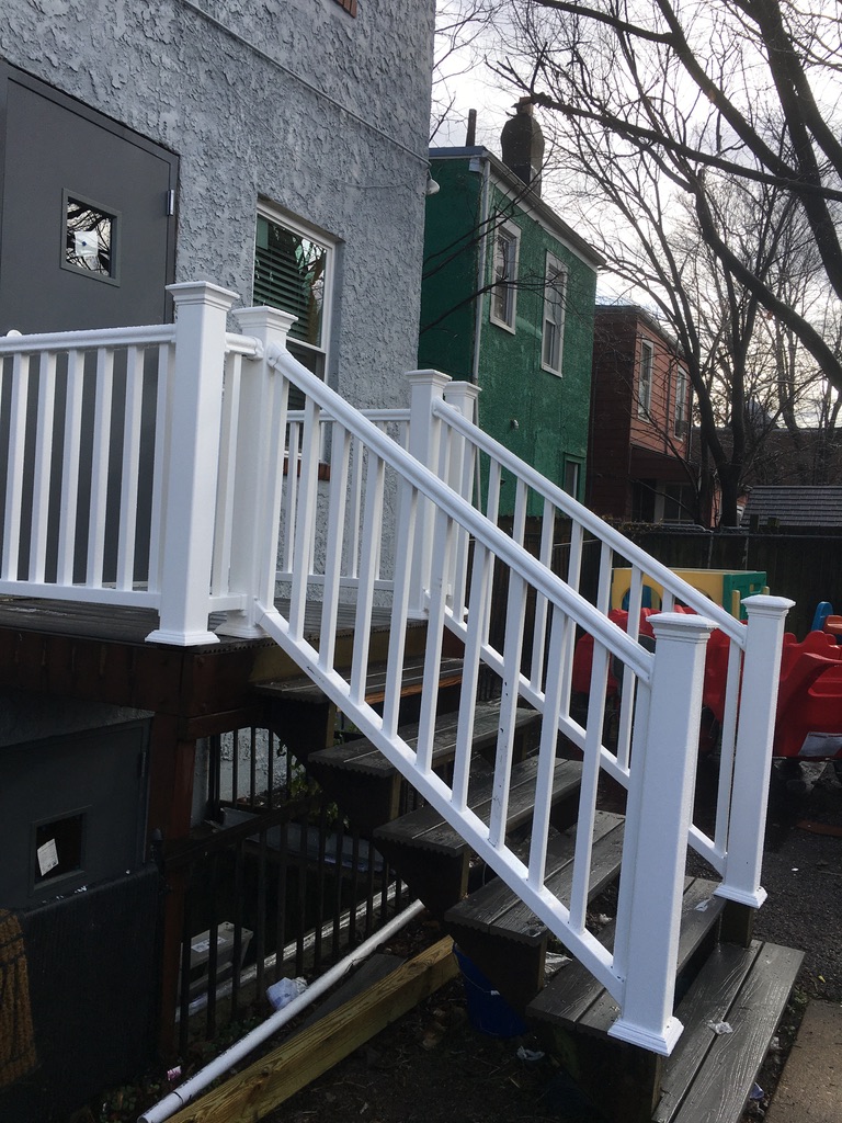Completed front entrance with new white PVC railings