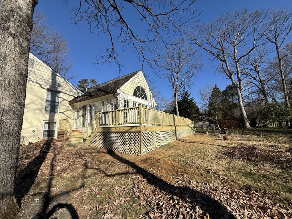 Completed deck — side view with new stairs