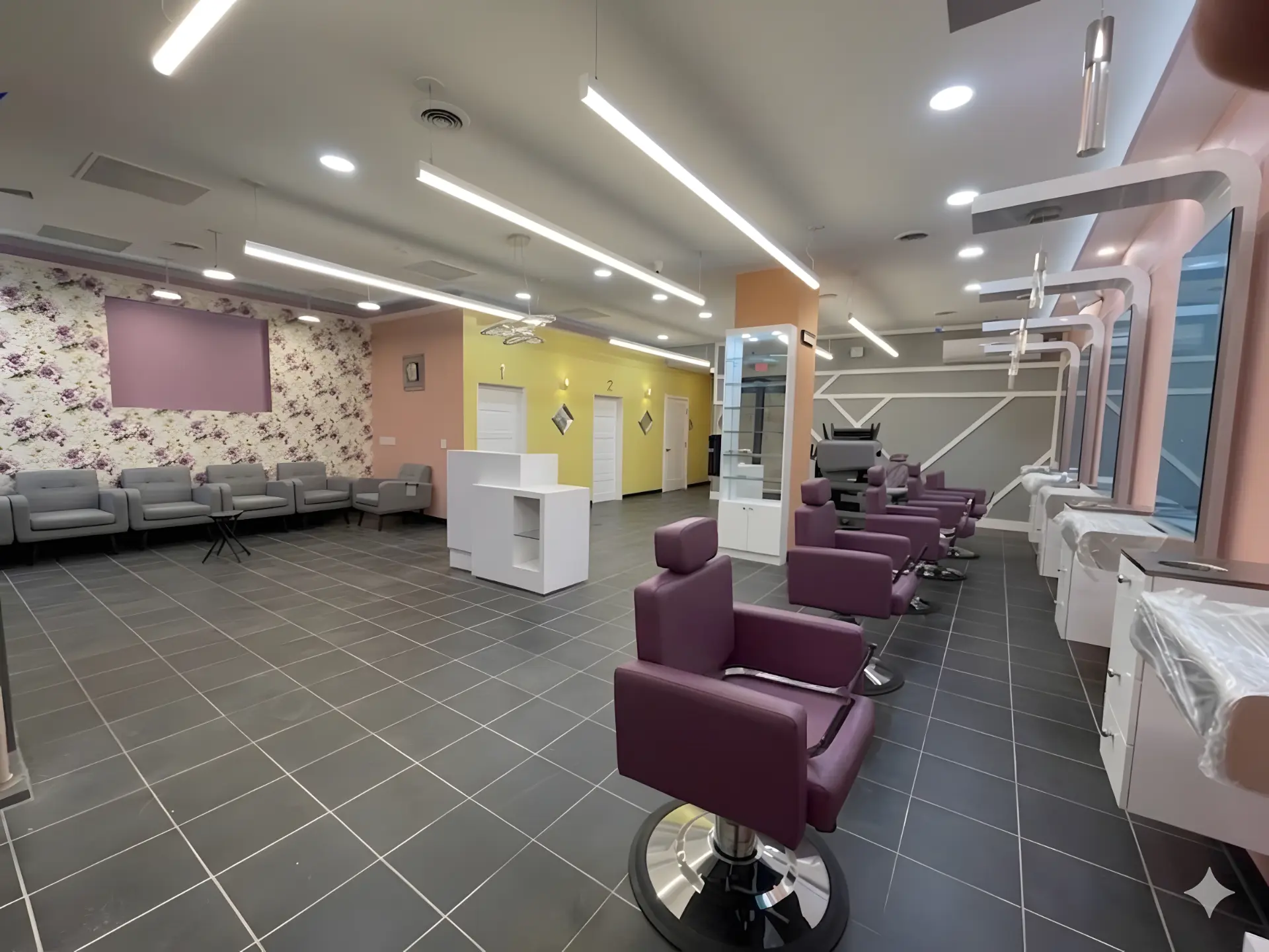 Finished beauty studio with styling stations, waiting area, and custom lighting