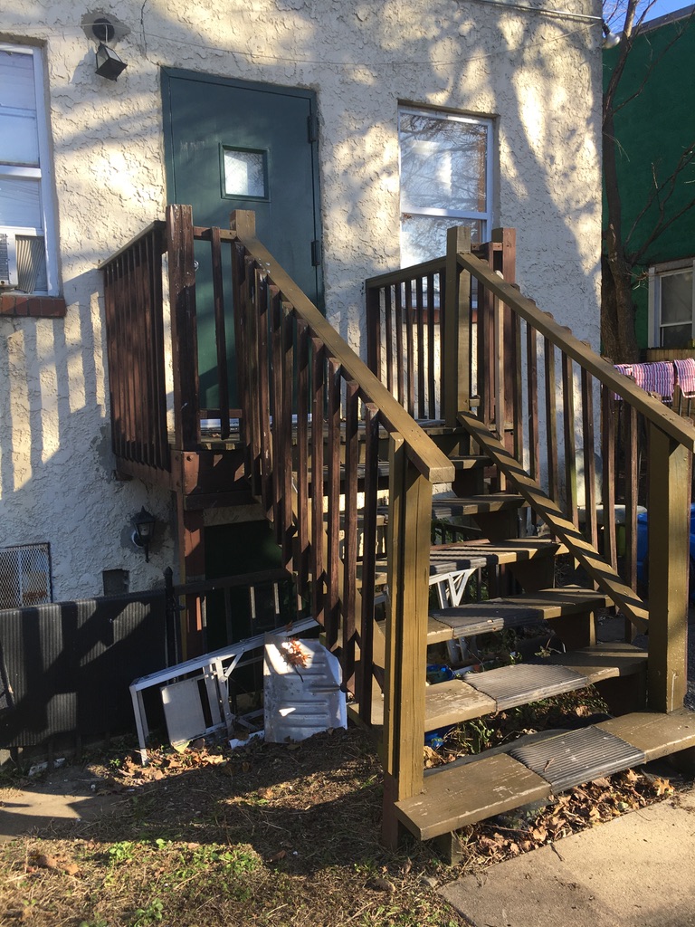 Existing rear entrance stairs before renovation