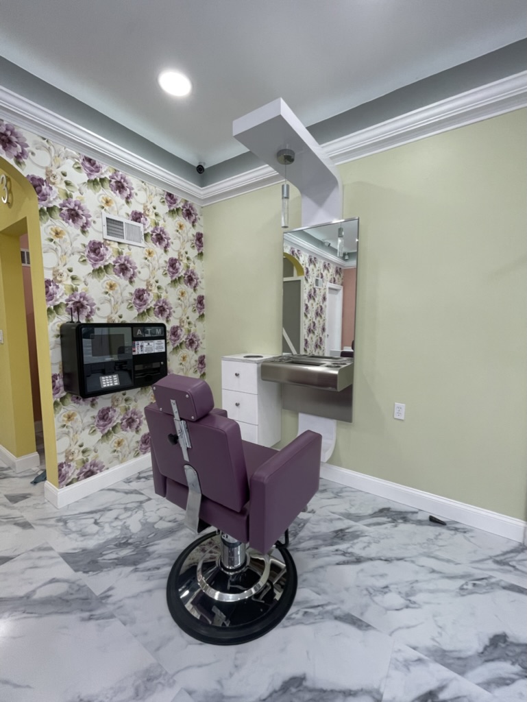 Individual beauty station with custom mirror and cabinetry