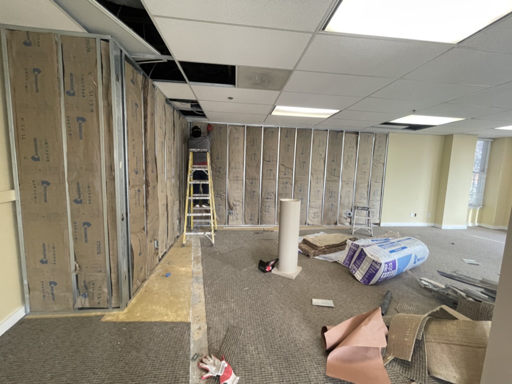 Metal stud framing and sound-control insulation installed